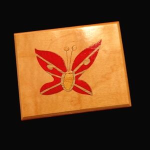 Small Italian wood music box with butterfly